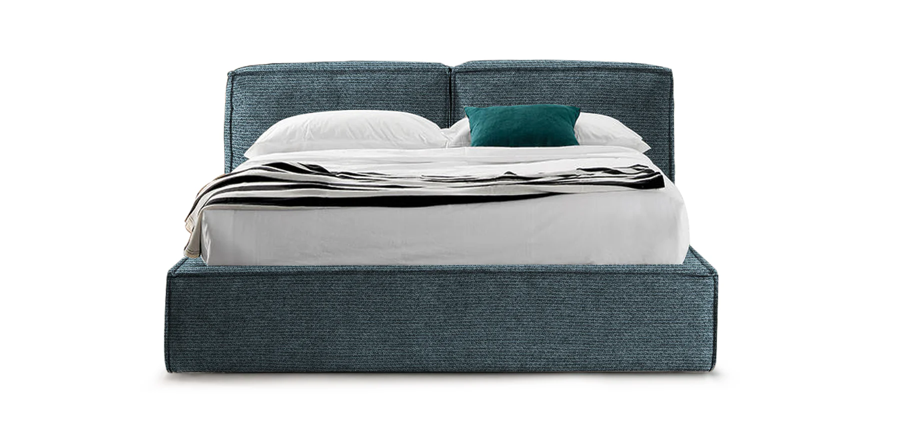 A low blue upholstered bed with a soft wrapped headboard